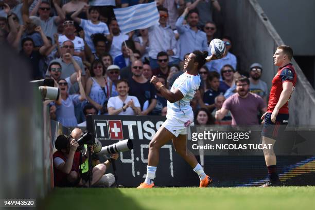 Racing 92's French winger Teddy Thomas celebrates after scoring a try during the European Champions Cup semi-final rugby union match between Racing...