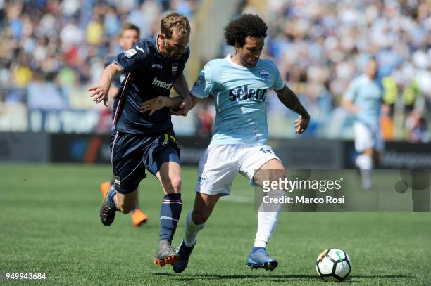 Felipe Anderson of SS Lazio compete for the ball with Ivan Strimic of UC Sampdoria during the serie A match between SS Lazio and UC Sampdoria at...