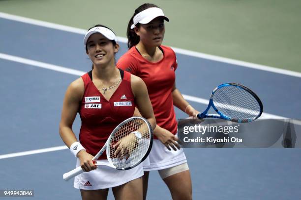 Miyu Kato and Makoto Ninomiya of Japan play in their doubles match against Johanna Konta and Heather Watson of Great Britain during day two of the...