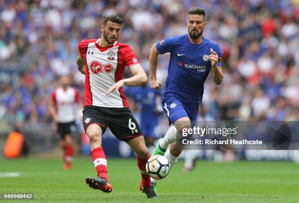 Wesley Hoedt of Southampton and Olivier Giroud of Chelsea during The Emirates FA Cup Semi Final match between Chelsea and Southampton at Wembley...