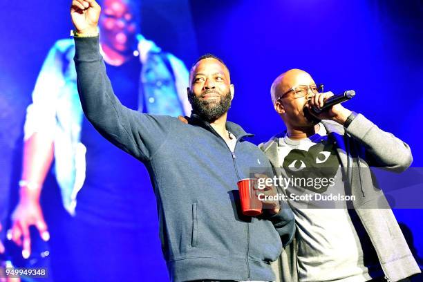 Rapper and Death Row Records cofounder The D.O.C. And Warren G perform onstage at The Forum on April 21, 2018 in Inglewood, California.