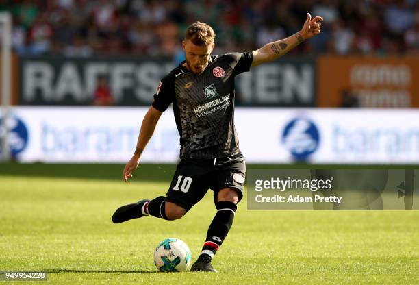 Alexandru Maxim of Mainz runs with the ball during the Bundesliga match between FC Augsburg and 1. FSV Mainz 05 at WWK-Arena on April 22, 2018 in...
