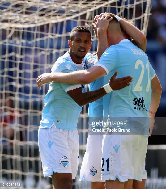 Ciro Immobile with his teammates Nani and Sergej Milinkovic of SS Lazio celebrates after scoring the team's third goal during the serie A match...