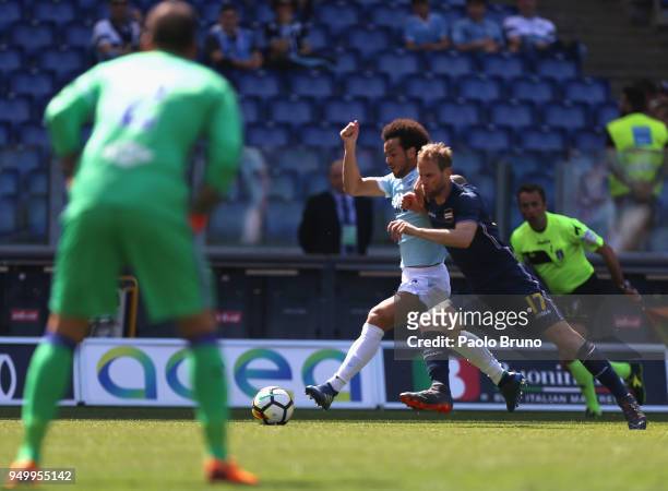 Felipe Anderson of SS Lazio competes for the ball with Ivan Strinic of UC Sampdoria during the serie A match between SS Lazio and UC Sampdoria at...