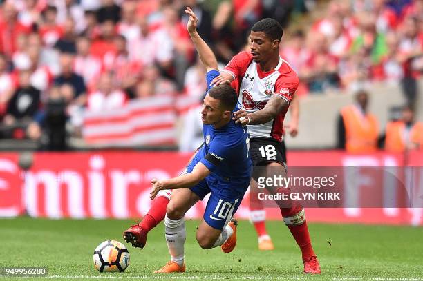 Southampton's Gabonese midfielder Mario Lemina fouls Chelsea's Belgian midfielder Eden Hazard during the English FA Cup semi-final football match...