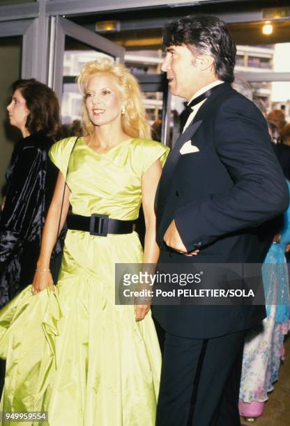 Sylvie Vartan et son époux Tony Scotti lors d'une soirée au Festival de Cannes en mai 1986, France.