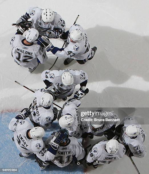 The Tampa Bay Lightning surround goaltender Mike Smith fllowing his 4-2 win over the New York Islanders at the Nassau Coliseum on December 21, 2009...
