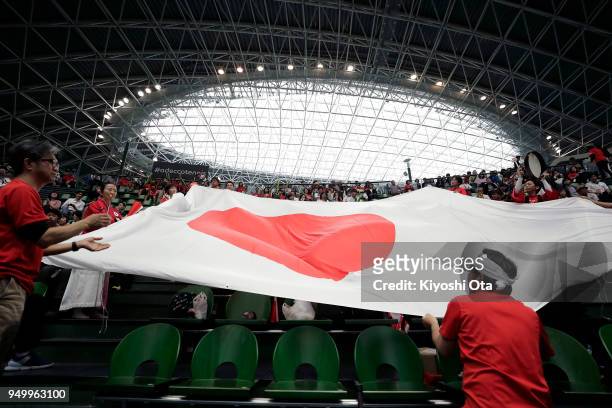 Fans cheer for Team Japan ahead of the singles match between Naomi Osaka of Japan and Johanna Konta of Great Britain during day two of the Fed Cup...