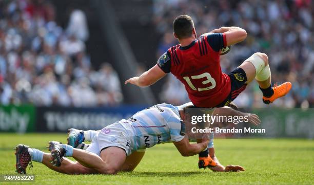 Bordeaux , France - 22 April 2018; Sam Arnold of Munster is tackled by Camille Chat and Henry Chavancy of Racing 92 during the European Rugby...