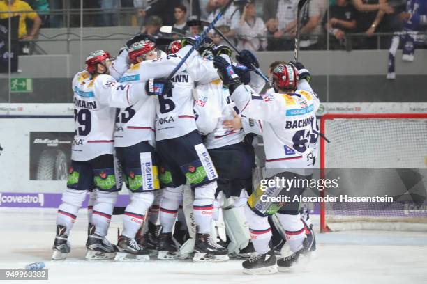 Players of Eisbaeren Berlin celebrate victory after winning the DEL Playoff final match 5 between EHC Red Bull Muenchen and Eisbaeren Berlin at...