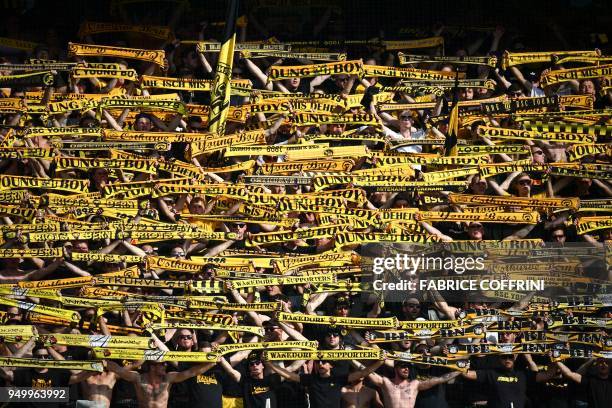 Supporters of the Swiss football club BSC Young Boys celebrate during the Swiss Super League football match Young Boys against Lausanne-Sport at the...