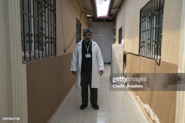 Syrian professor Faiz Matar, , who lost his left leg's patella during a bombing that landed on his house in Syria on 2015, is seen at Academical...