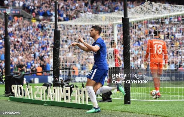 Chelsea's Spanish striker Alvaro Morata celebrates scoring his team's second goal during the English FA Cup semi-final football match between Chelsea...