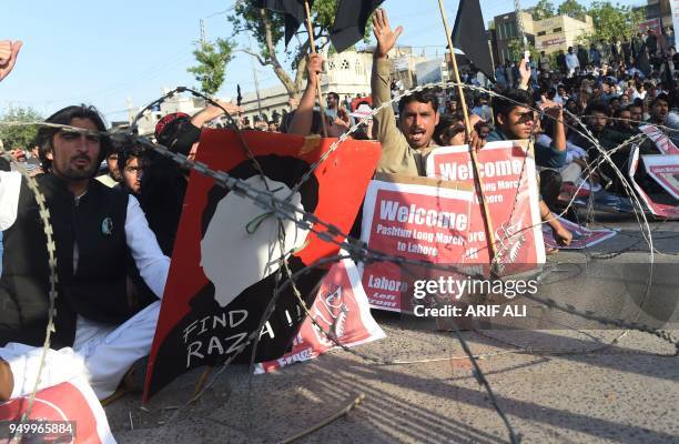 Pakistani members of the Pashtun Protection Movement and student activists gather during a demonstration in Lahore on April 22, 2018. - Thousands of...