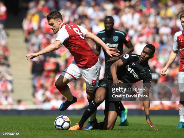 Aaron Ramsey of Arsenal takes on Edimilson Fernandes of West Ham during the Premier League match between Arsenal and West Ham United at Emirates...