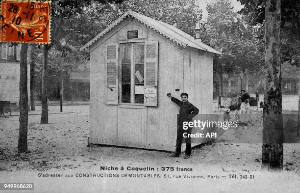 Carte postale publicitaire pour une niche à coquelin, constructions démontables vers 1910 à Paris en France.