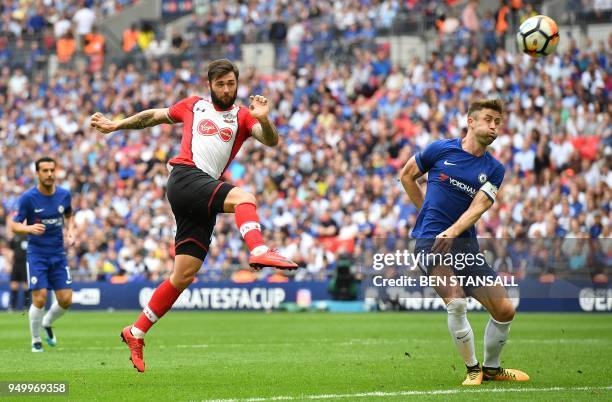 Southampton's English striker Charlie Austin shoots but fails to score during the English FA Cup semi-final football match between Chelsea and...