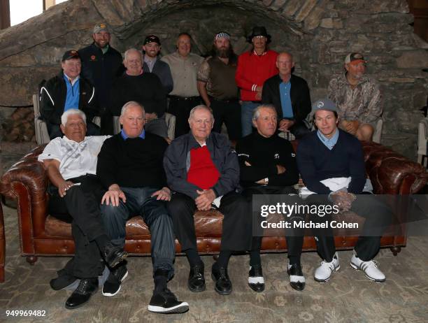 Participants pose for photos prior to the Bass Pro Shops Legends of Golf Celebrity Shootout at Big Cedar Lodge held at Top of the Rock on April 22,...