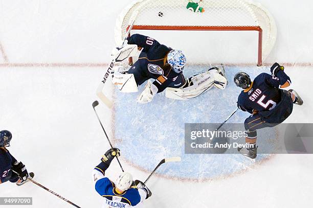 Keith Tkachuk of the St. Louis Blues watches the puck go past Devan Dubnyk of the Edmonton Oilers for a third period goal at Rexall Place on December...