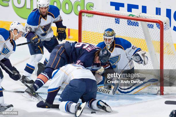 Zack Stortini of the Edmonton Oilers crashes the St. Louis Blues' net at Rexall Place on December 21, 2009 in Edmonton, Alberta, Canada. The Blues...