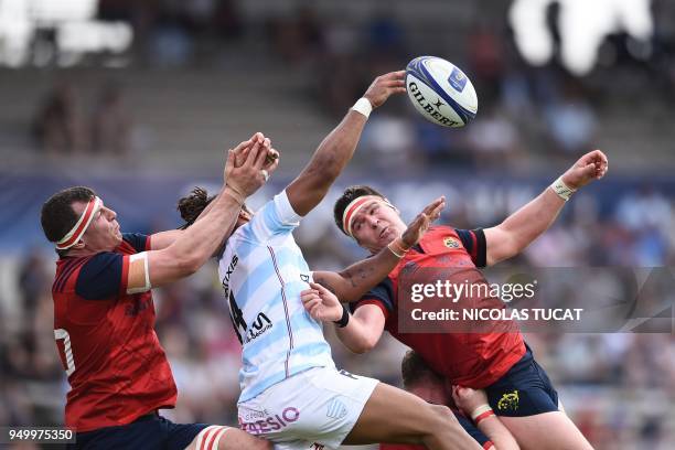 Racing 92's French winger Teddy Thomas jumps for the ball during the European Champions Cup semi-final rugby union match between Racing 92 and...