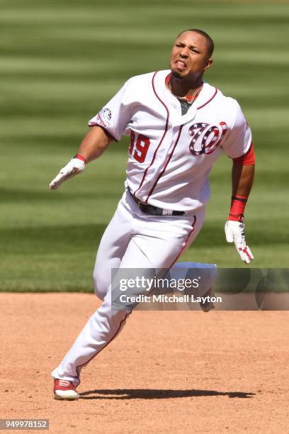 Moises Sierra of the Washington Nationals runs to third base during a baseball game against the Colorado Rockies at Nationals Park on April 14, 2018...