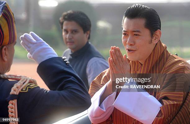 King of Bhutan, Jigme Khesar Namgyel Wangchuck greets Indian army soldiers during a welcome ceremony at the Presidential Palace in New Delhi on...