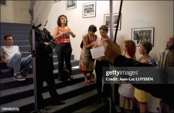 Workers in the entertainment industry without a steady job interrupt the recording of the TV talk show "C'est Mon choix" at the Maison de la Radio.