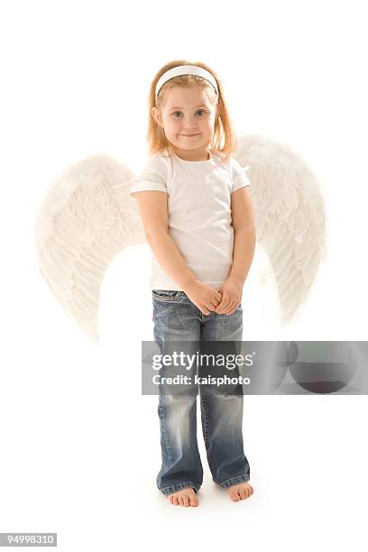 a cute girl in a little angel costume - jeans barefoot girl stock pictures, royalty-free photos & images