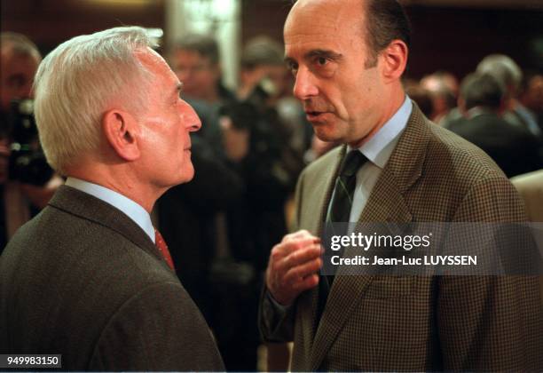 Jerome Monod and Alain Juppe.