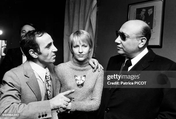 Charles Aznavour with his wife Ulla and Bruno Coquatrix.