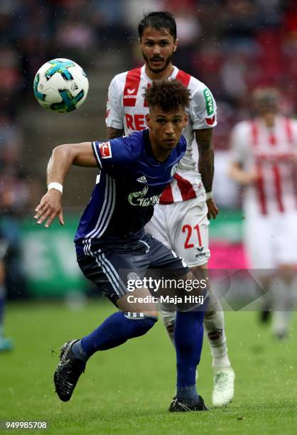 Leonardo Bittencourt of Koeln and Thilo Kehrer of Schalke battle for the ball during the Bundesliga match between 1. FC Koeln and FC Schalke 04 at...