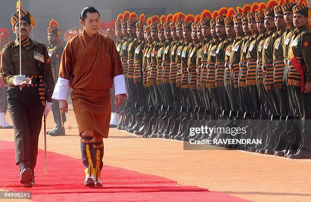 King of Bhutan, Jigme Khesar Namgyel Wangchuck inspects the Guard of Honour during a welcome ceremony at the Presidential Palace in New Delhi on...