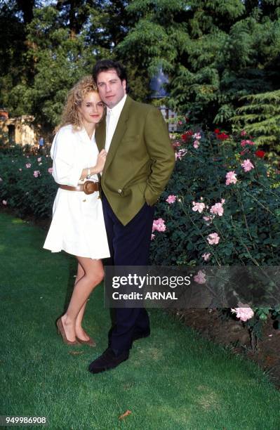 John Travolta with Kelly Preston.