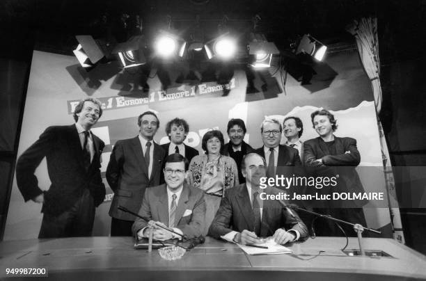 The new team at EUROPE 1 holding a press conference in Paris to present the new programs and schedules, on March 4, 1987. From left to right, seated:...
