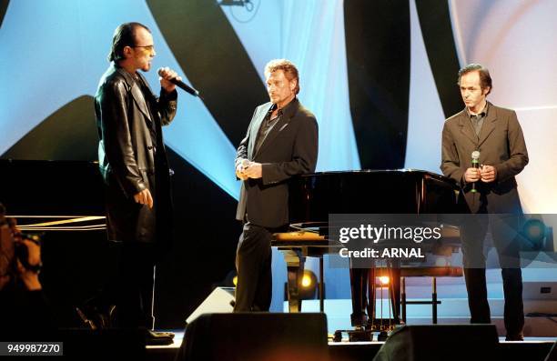 Johnny Hallyday, Jean-Jacques Goldman and Pascal Obispo.