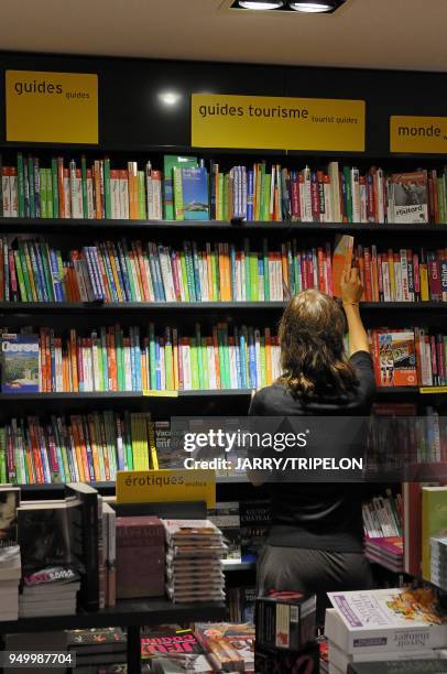 The bookshop of the Publicis Drugstore in The Champs Elysees avenue, 8 th district in Paris, Ile de France region, France.