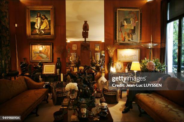 Pierre Berge at the home of Yves Saint Laurent, rue de Babylone. On the wall : "The Portrait of Alfred de Dreux and his sister Elizabeth" by...