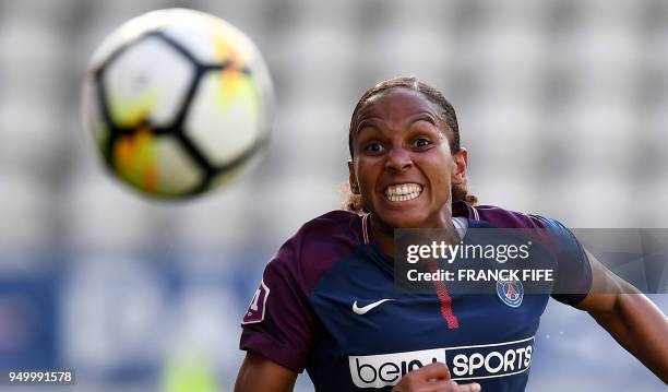 Paris Saint-Germain's French forward Marie-Laure Delie eyes the ball during the French D1 Women's football match between Paris Saint-Germain and...