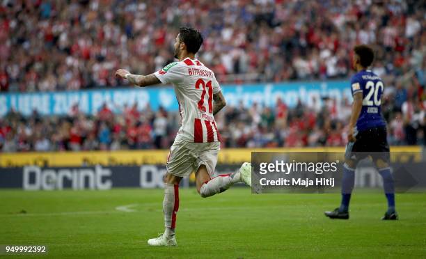Leonardo Bittencourt of Koeln celebrates after he scores the connecting goal during the Bundesliga match between 1. FC Koeln and FC Schalke 04 at...