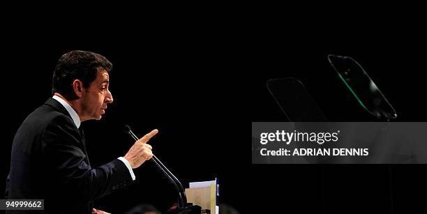 France's President Nicolas Sarkozy gives his speech during the plenary session at the Bella Center in Copenhagen on December 17, 2009 on the 11th day...