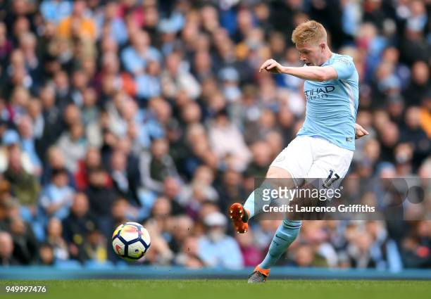 Kevin De Bruyne of Manchester City shoots and scores his side's third goal during the Premier League match between Manchester City and Swansea City...