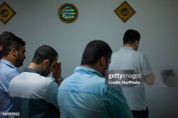 Rami Al Batsh, brother of Fadi Mohammad al-Batsh who killed yesterday is prayed for his brother at the forensic of Selayang hospital in Kuala Lumpur,...