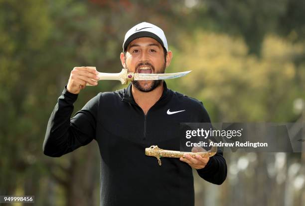 Alexander Levy of France celebrates with the winners trophy after the final round of the Trophee Hassan II at Royal Golf Dar Es Salam on April 22,...