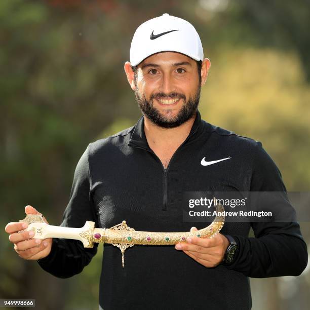 Alexander Levy of France celebrates with the winners trophy after the final round of the Trophee Hassan II at Royal Golf Dar Es Salam on April 22,...