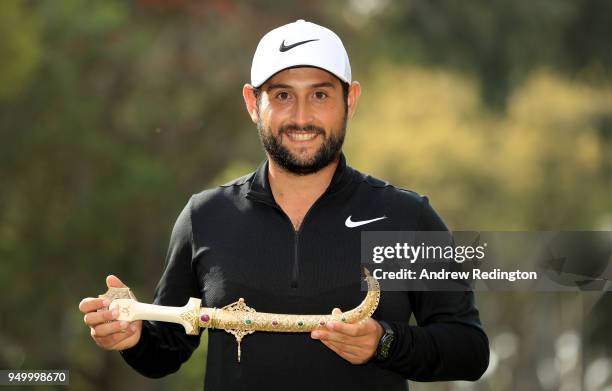 Alexander Levy of France celebrates with the winners trophy after the final round of the Trophee Hassan II at Royal Golf Dar Es Salam on April 22,...