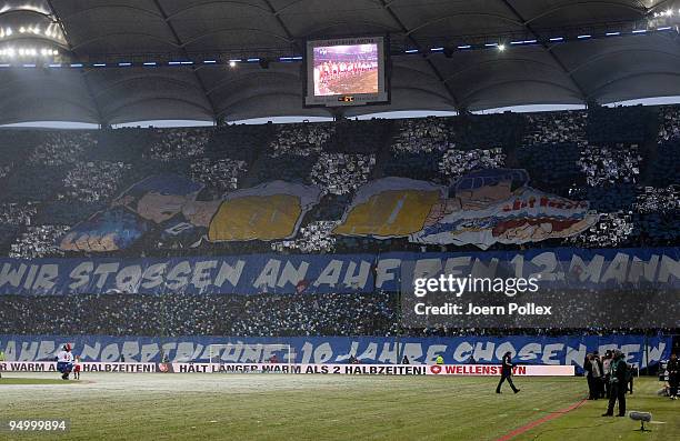 Fans of Hamburg show a banner prior to the Bundesliga match between Hamburger SV and Werder Bremen at HSH Nordbank Arena on December 20, 2009 in...