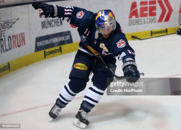 Rejoicing of Keith Aucoin of Red Bull Munich during the DEL Playoff final match five between EHC Red Bull Munich and Eisbaeren Berlin on April 22,...