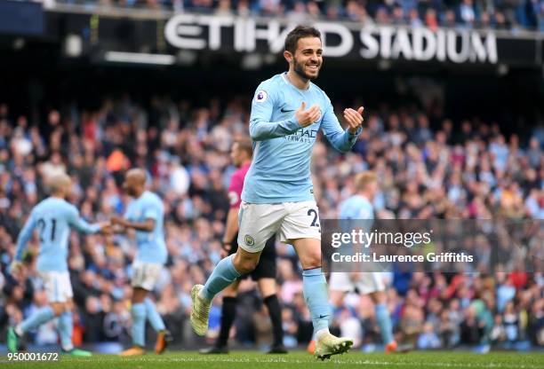 Bernardo Silva of Manchester City celebrates scoring his side's fourth goal during the Premier League match between Manchester City and Swansea City...