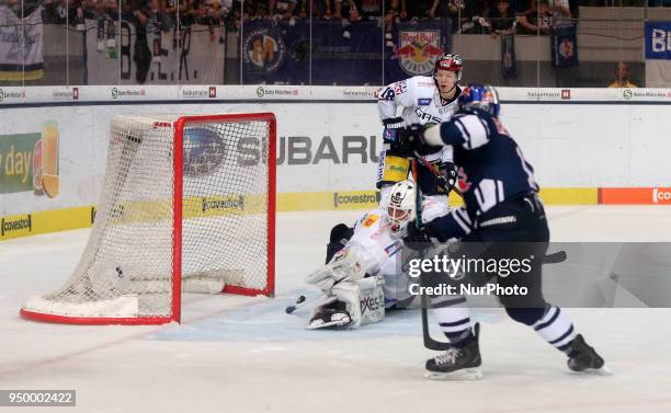 Keith Aucoin of Red Bull Munich scores the 5:5 during the DEL Playoff final match five between EHC Red Bull Munich and Eisbaeren Berlin on April 22,...